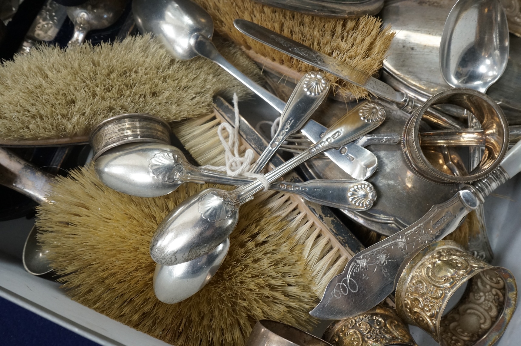 A quantity of assorted silver items including four silver and enamel clothes or hair brushes by Charles S. Green & Co Ltd, Birmingham, 1923, nine other mounted dressing table items, a Victorian christening trio, a set of